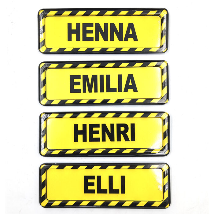 Erä nimikylttejä musta/keltainen
